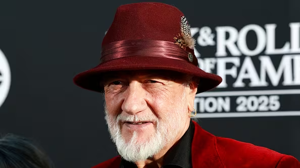 Mick Fleetwood spouse Elizabeth Jordan together at event